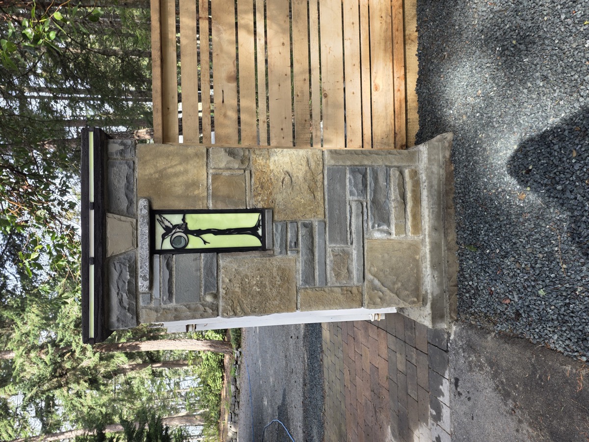 Stone pillar with stained glass inlay — R.A. McCulloch Builders